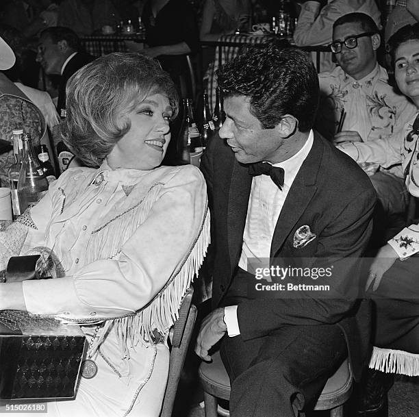 Hollywood: Singer Eddie Fisher talks to singer Edie Adams at the Eighth Annual Share Party at the Moulin Rouge. Fisher made his first public...