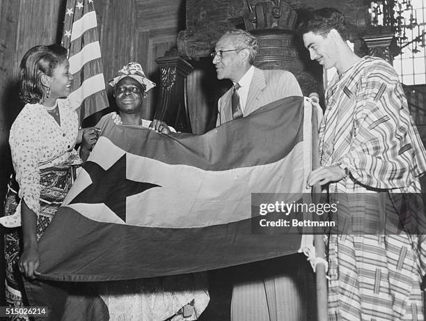 Philadelphia, Pennsylvania: Ghana Flag Unfurled at Independence Hall: Ceremonies at the Liberty Bell celebrate the creation of the new African nation...