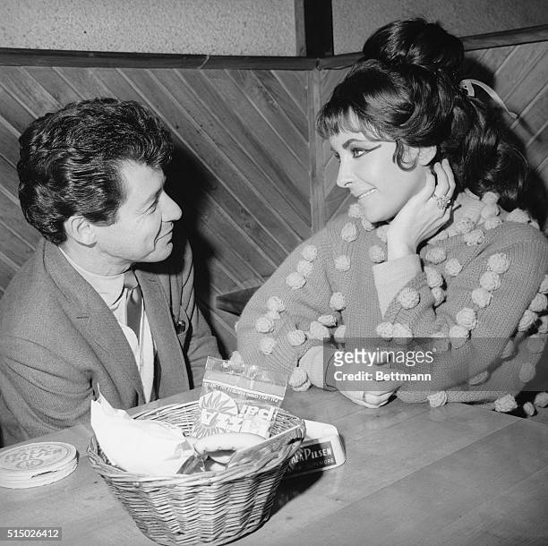 Rome: If looks can kill, the look passing between Eddie Fisher and Elizabeth Taylor here March 12th, should kill most of the rumors that their...