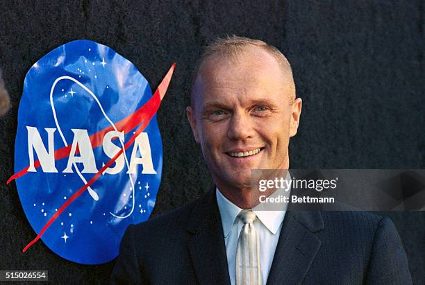 Astronaut John Glenn with NASA Logo