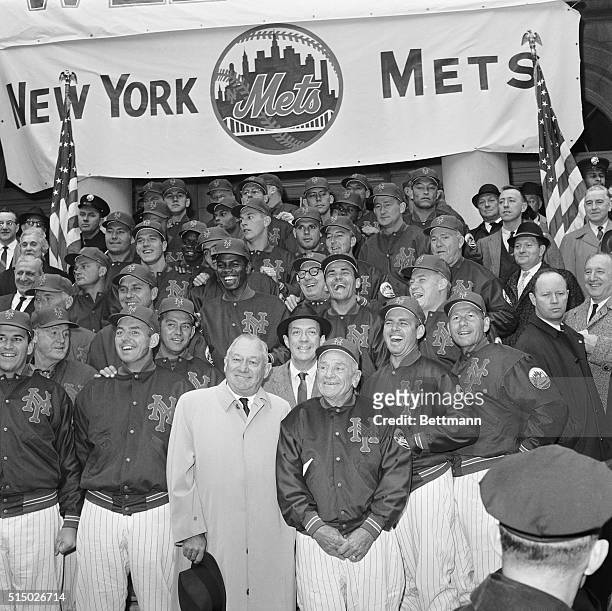 The New York Mets' new National League baseball team, poses on the steps of City Hall April 12th, after they received a traditional ticker tape...