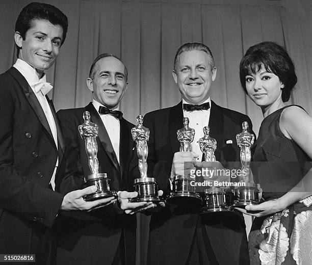 Santa Monica, California: The film West Side Story made a clean sweep of the 34th annual Academy Award presentations and posed here are four of the...