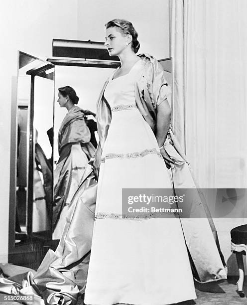 Ingrid Models Anastasia Wardrobe. London, England: Actress Ingrid Bergman, wife of Italian director Roberto Rossellini, in costumes created for her...