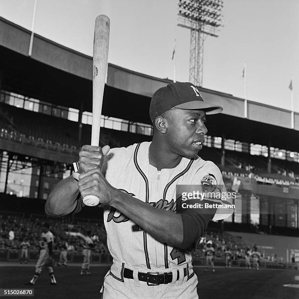 Hank Aaron Holding Baseball Bat