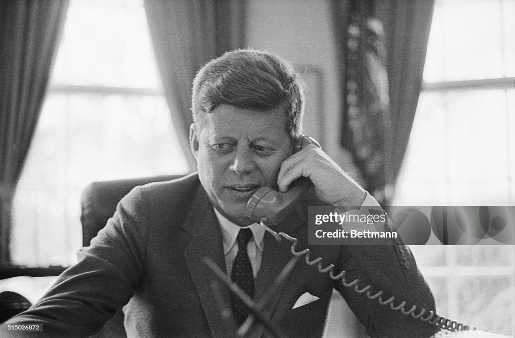 John Kennedy Using Telephone