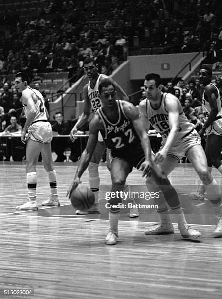 Los Angeles' Elgin Baylor dribbles the ball as he goes to scores during the 2nd period of the Detroit Pistons-Los Angeles Lakers playoff game 3/29....