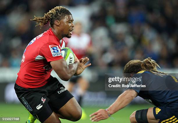 Howard Mnisi of the Lions on the attack during the round three Super Rugby match between the Highlanders and the Lions at Rugby Park on March 12,...