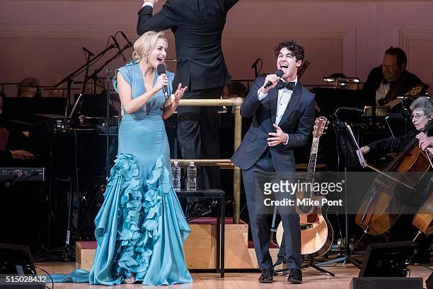 Actors Betsy Wolfe and Darren Criss perform during The New York Pops: Darren Criss and Betsy Wolfe in Concert at Carnegie Hall on March 11, 2016 in...