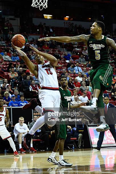 Lionel Ellison of the Fresno State Bulldogs drives to the basket against Fred Richardson of the Colorado State Rams during a semifinal game of the...