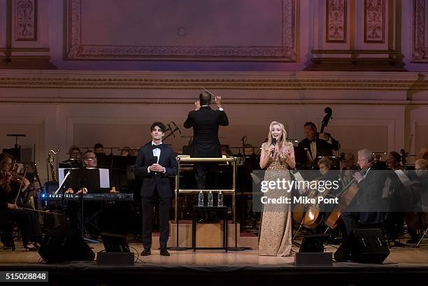 Actors Darren Criss and Betsy Wolfe perform during The New York Pops: Darren Criss and Betsy Wolfe in Concert at Carnegie Hall on March 11, 2016 in...