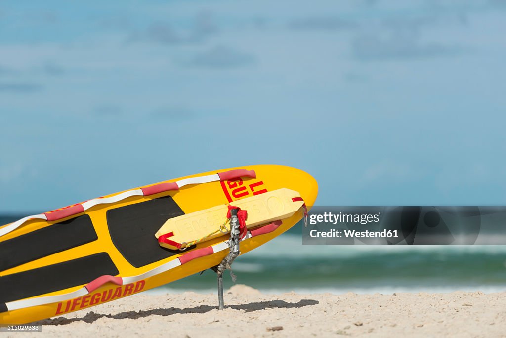 Australia, New South Wales, Pottsville, beach with a lifeguard rescue board