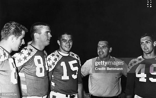 All-Stars get together with coach Otto Graham at Soldiers Field following workout under the lights 8/1 in preparation for Friday night game against...