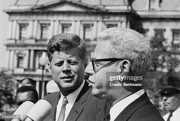 Secretary of Labor Arthur Goldberg speaks to Latin American and Caribbean labor leaders at the White House, while President John F. Kennedy looks on....