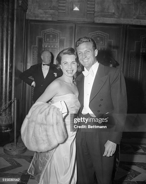 The actor Robert Stack and his wife, actress Rosemarie Bowe, posing together at the twenty-ninth Academy Awards Presentation at the Pantages Theater...