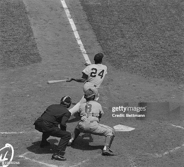 Willie Mays, clobbered a 2-run homer in the third inning to put the Giants ahead by 4-3, in game with the Chicago cubs today. This is a description...