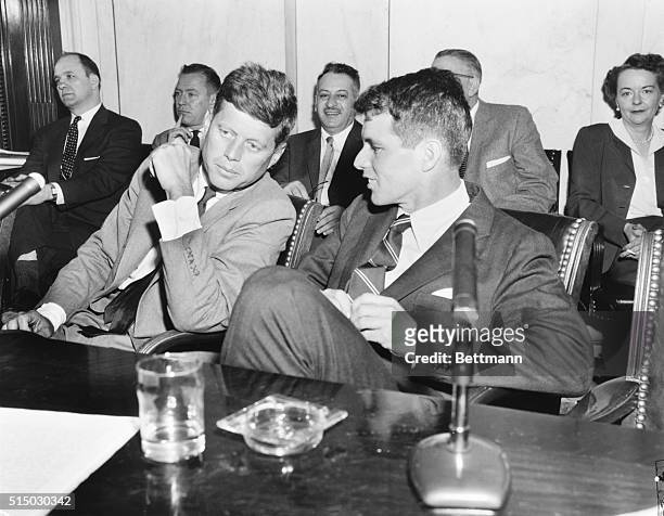 Robert F. Kennedy , counsel of the Senate Committee on Racketeering in Labor and Industry, and his brother John F. Kennedy , a member of the...