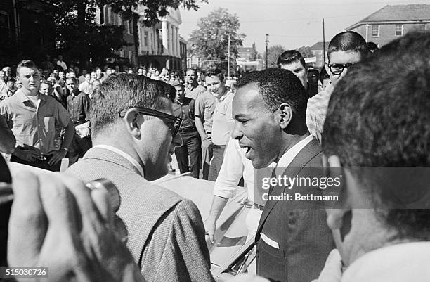 James Meredith, the first Negro student at the University of Mississippi, looks enthusiastic as as he talks to newsmen after class here 10/2. He...
