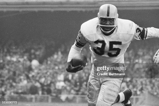 John Henry Johnson , of the Pittsburgh Steelers, running in game with NY Giants, October 14, 1962.