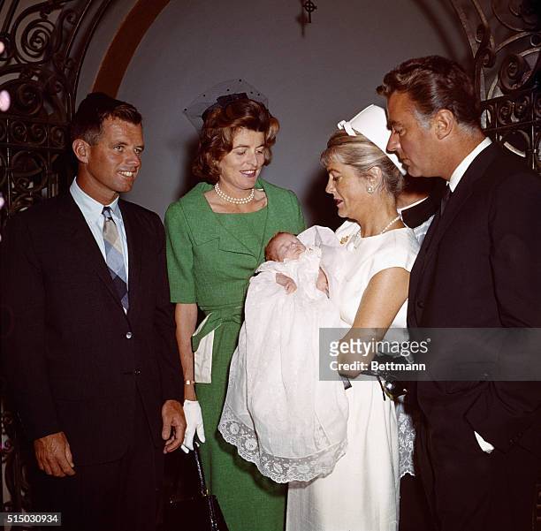 Santa Monica, Calif: President Kennedy's newest niece, Robin Elizabeth Lawford, was christened today at St. Monica's Catholic Church. Actor Gary...
