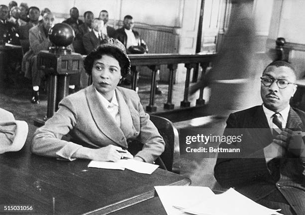 Mrs. Daisy Bates, State President of the Arkansas NAACP sits in the circuit court with one of her lawyers, Robert L. Carter of New York as her appeal...