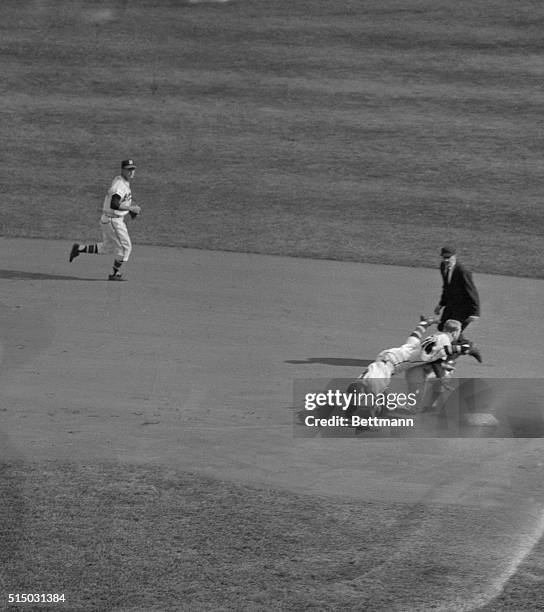 Mickey Mantle, Yankees' slugging center fielder was missing from the starting lineup today as the Braves and Yankees met for the fifth game of the...