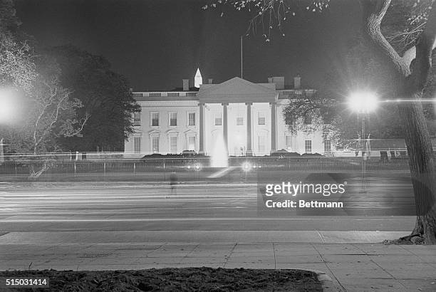 Washington: At the White House and the State Department lights are burning late 10/22 as official business continues on into the night after...