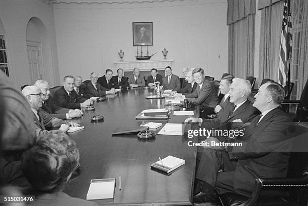 Members of Congress are briefed at the White House by President Kennedy on international affairs. The members present are: Senator Richard B....