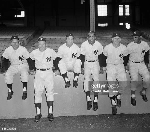 You can't blame these Yankees if they see waving in the breeze of Yankee Stadium, one 1957 American League pennant. Their team is six and one-half...