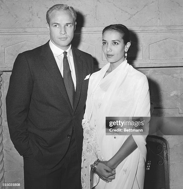 Actor Marlon Brando, one of Hollywood's most eligible bachelors is shown with his bride, Indian actress Anna Kashfi. Marlon and Anna were married...