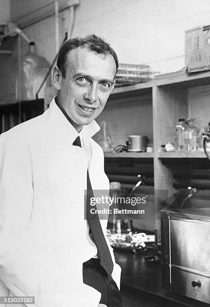 Dr. James Deuer Watson, the famous biologist, is shown here in his lab.