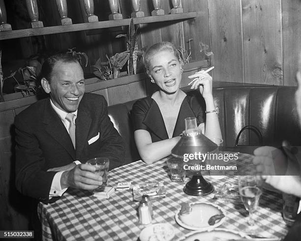 People Will Say Their'etc! Hollywood, California: Frank Sinatra and Lauren Bacall, widow of Humphrey Bogart, are shown at the party thrown by Sinatra...