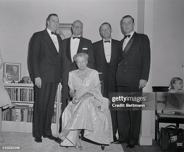 In the first family picture in years, Mrs. Eleanor Roosevelt poses with her sons in her apartment before attending poses with her sons in her,...