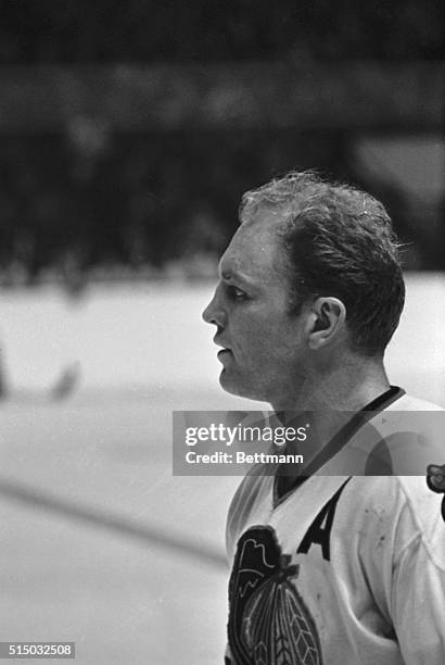 Goalie Bruce Gamble looks on here as Bobby Hull, of the Chicago Black Hawks, entered the net, almost hitting the goal post and scoring his 50th...