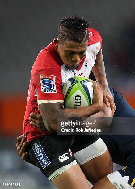 Elton Jantjies of the Lions is tackled by Malakai Fekitoa of the Highlanders during the round three Super Rugby match between the Highlanders and the...