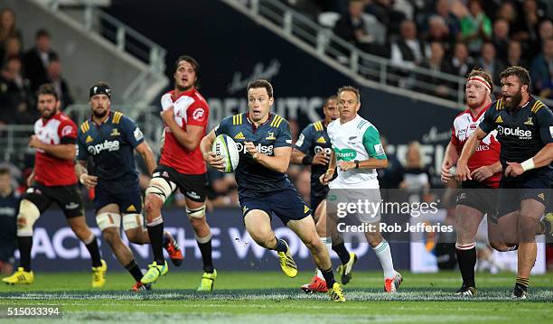 Ben Smith of the Highlanders on the attack during the round three Super Rugby match between the Highlanders and the Lions at Rugby Park on March 12,...