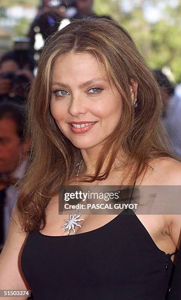 Italian actress Ornella Muti poses upon her arrival at the Palais des Festivals for the screening of Danish director Lars Von Trier movie "Dancer in...