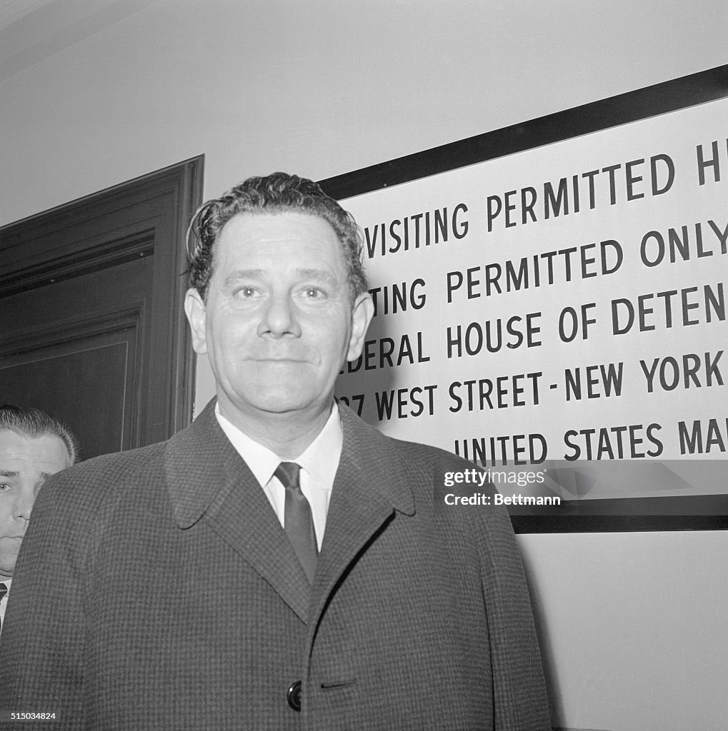 Portrait of Peter Hurkos Posing by Courthouse Sign