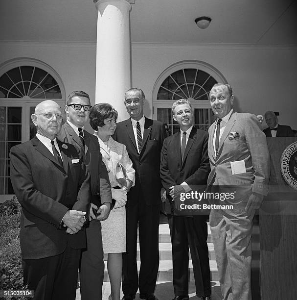 Washington: Pres. Johnson presented medallions to winners of the annual Intercollegiate Journalism awards program sponsored by the William Randolph...