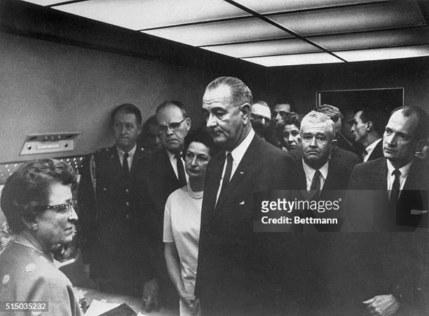 Prepare for Swearing-In. New York: Aboard Air Force One in Dallas November 22 Lyndon B. Johnson awaits swearing-in by Judge Sarah T. Hughes ....