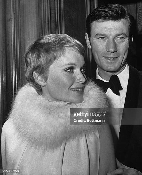 Shown in the foyer of the Odeon, Leicester Square, for the world Charity Premier of Casino Royale,on April 13th, are Mia Farrow and Laurence Harvey.