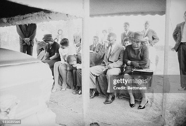 August 7, 1964 - Meridian, Mississippi: The family of slain civil rights worker James Chaney weeps following a brief funeral service. From left :...