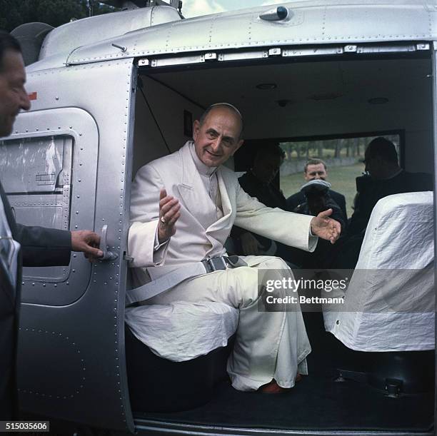 Castel Gandolfo, Italy: Pope Paul VI inside helicopter in the garden of the papal summer residence here for a flight to the central Italian cathedral...