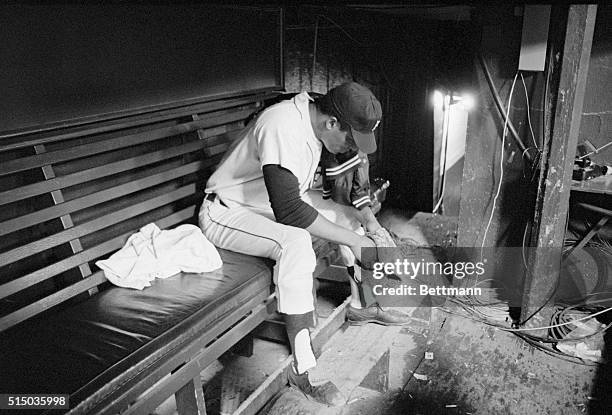 Detroit: Tiger pitcher Earl Wilson sits alone in the Tiger dugout long after the rest of the team went to the dressing room following defeat by the...