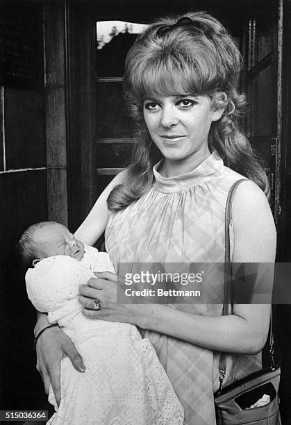 Ringo's new son...Maureen Starkey, wife of Ringo Starr, drummer of the Beatles, and her recently-born son, Jason, leave Queen Charlotte's Hospital....