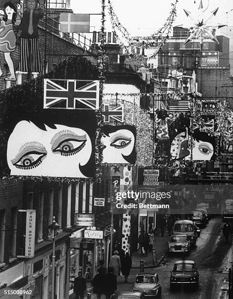 Carnaby Street, London's famed mod mecca, remains true to its far-out image with op-art decorations heralding the coming Christmas season.