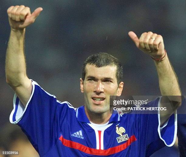French playmaker Zinedine Zidane celebrates at the end of the Euro-2000 soccer championships after France won the final against Italy, 2-1, at...