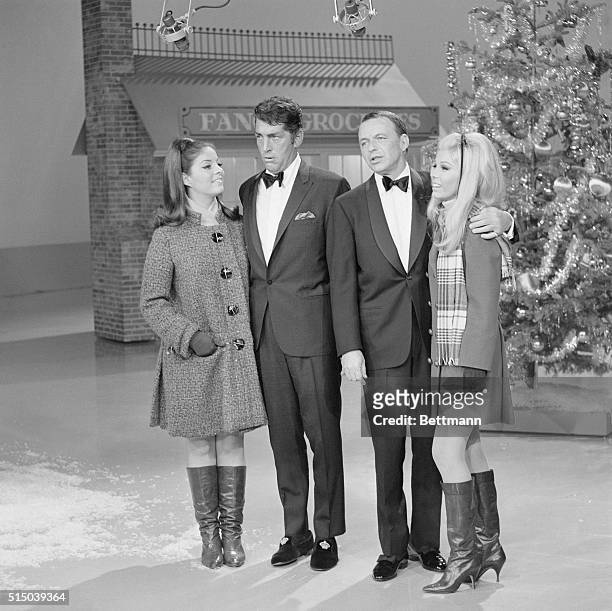 Hollywood, California: Part of a star studded, two family Christmas show to be seen 12/21 over NBC features L-R: Gail Martin, her dad, Dean Martin,...