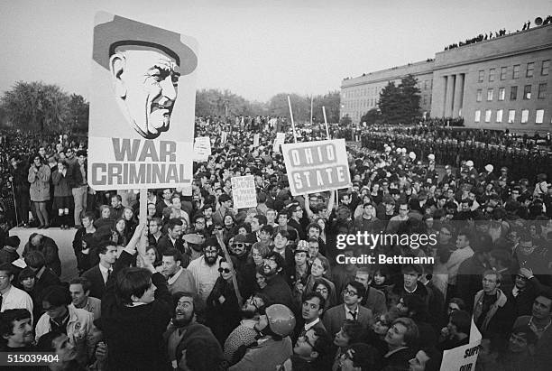 War Criminal. Washington, D.C.: Peace demonstrators display a huge sign referring to president as a war criminal during huge anti-Vietnam war protest...