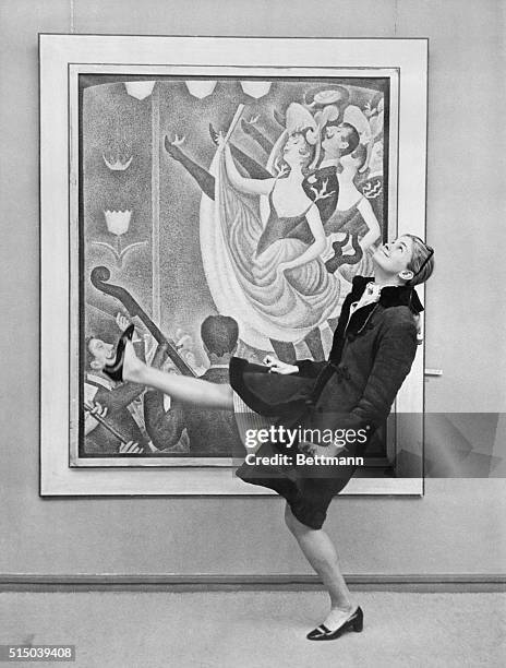 Museum Caper. Amsterdam, Holland: Candice Bergen imitates the central figure of a Seurat painting hanging in Amsterdam's Kroller Muller Museum. The...