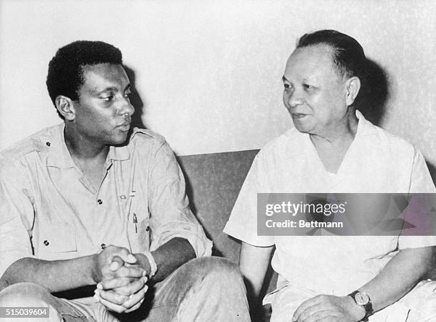 Civil rights activist Stokely Carmichael , one of the most outspoken of the American "Black Power" movement leaders, talking to Troung Chinh,...